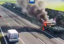 Vlammen slaan uit busje op A27, verkeer wordt omgeleid